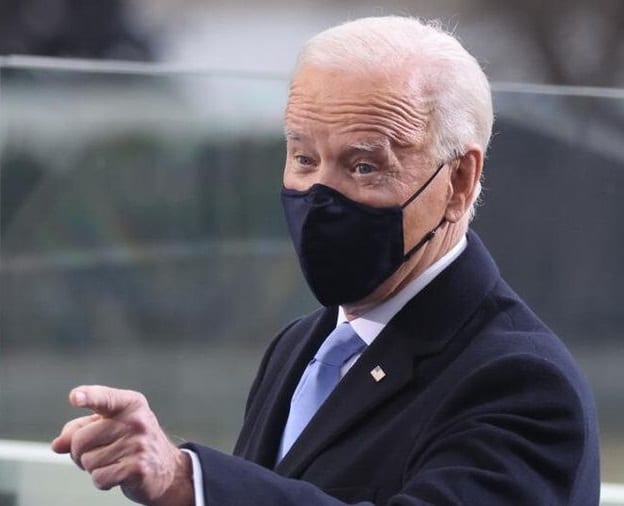 President Biden signs executive order mandating masks on airline flights
